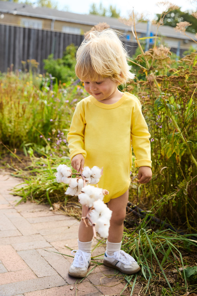 O11130 BABIES LONG SLEEVE BODYSTOCKING